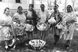 Jicarilla Apache women winning prizes for basketry at NM State Fair, 1980. Photo by the Jicarilla Apache Chieftain.